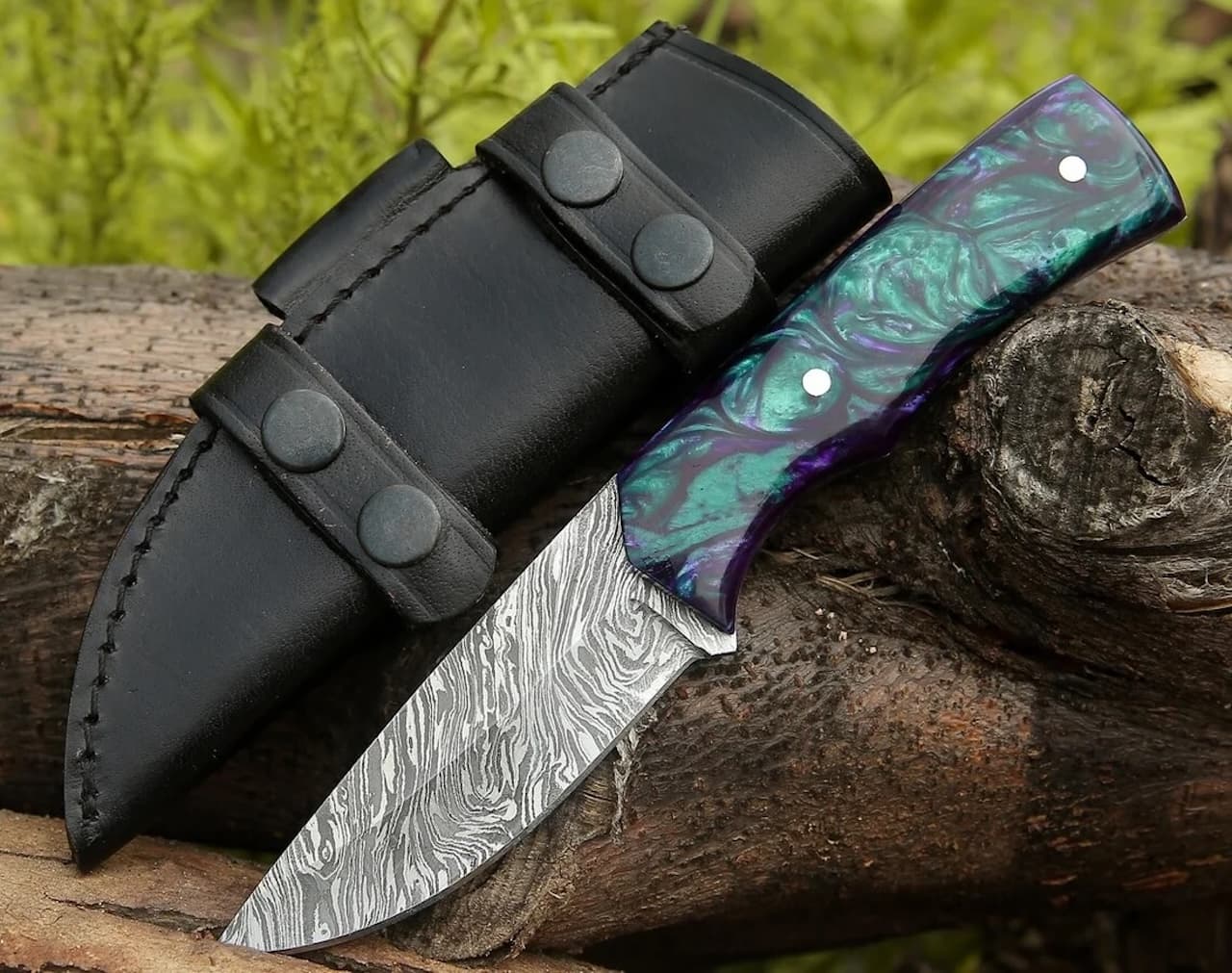 Stainless steel knife with epoxy handle